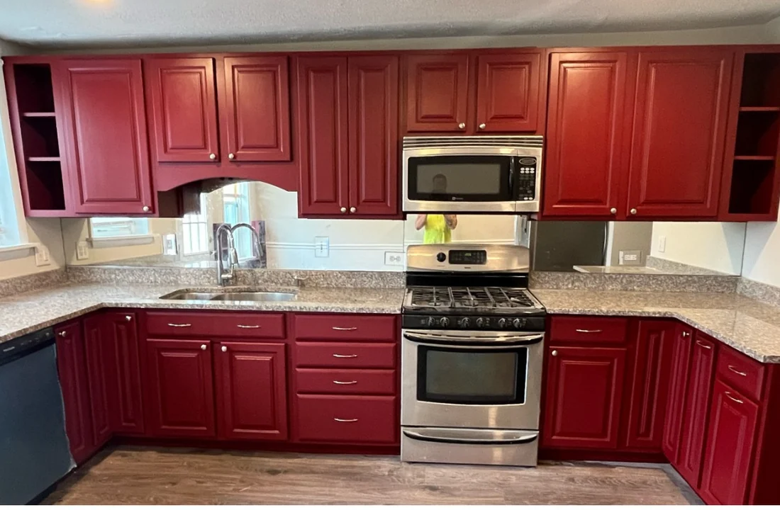 Kitchen cabinets refinished in deep red